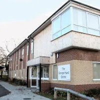 The George Hurd Centre: a two-storey brick building with its name on a sign beside the entrance