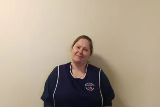 One of our nail cutters in her navy BCTS tabard